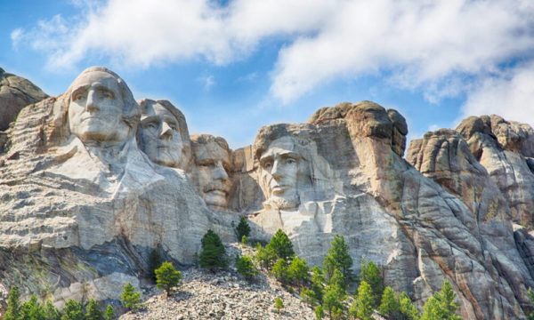 Mount Rushmore with a blue sky