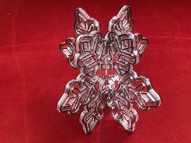 3D Snowflake with a red background
