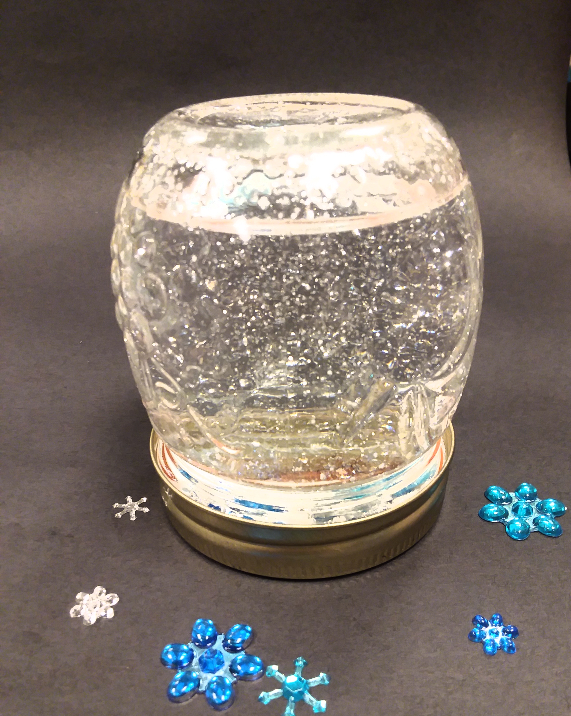 snow globe made from a glass jar