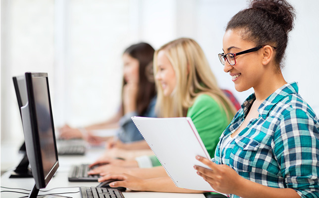 Students doing research on computers