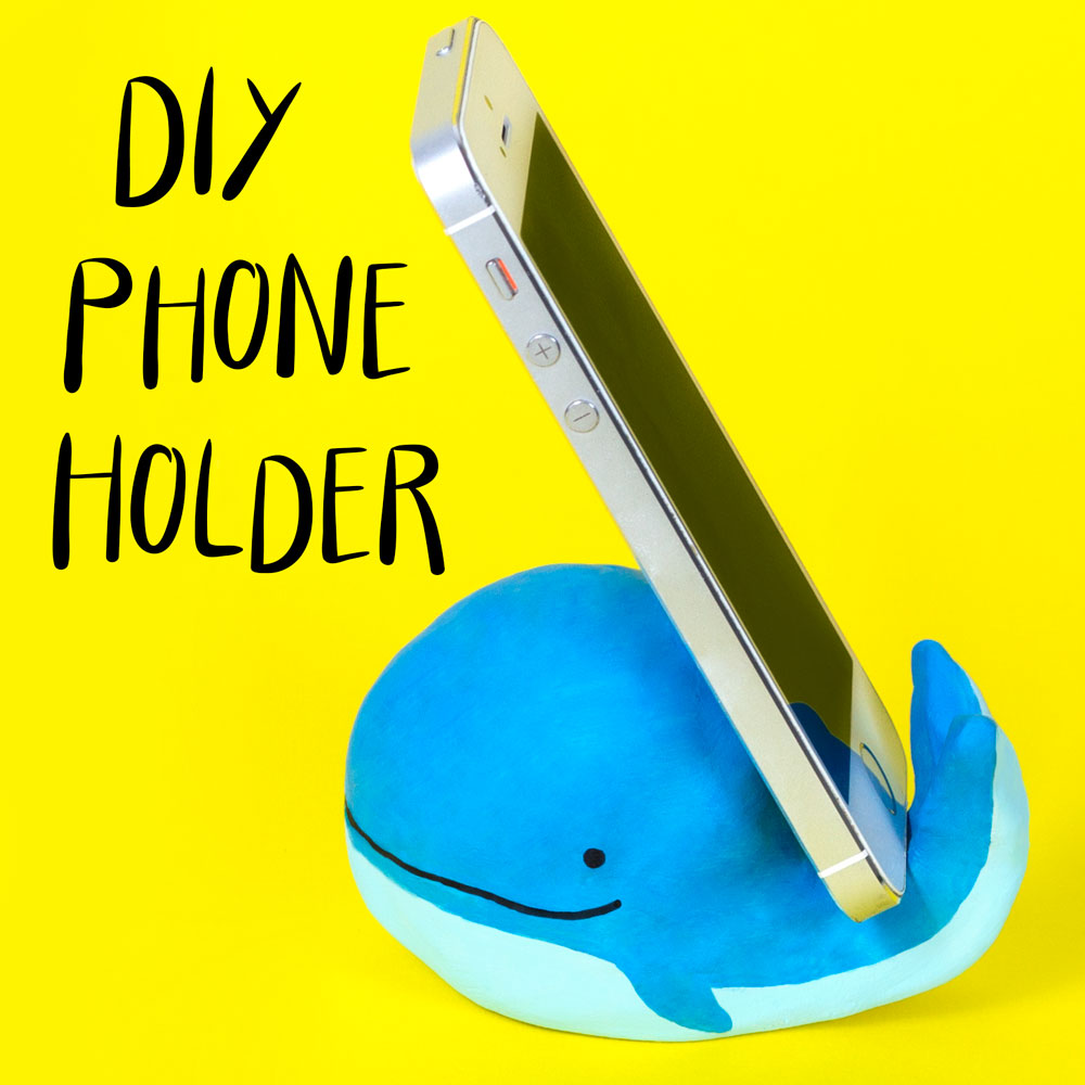 Image of whale phone holder and a phone
