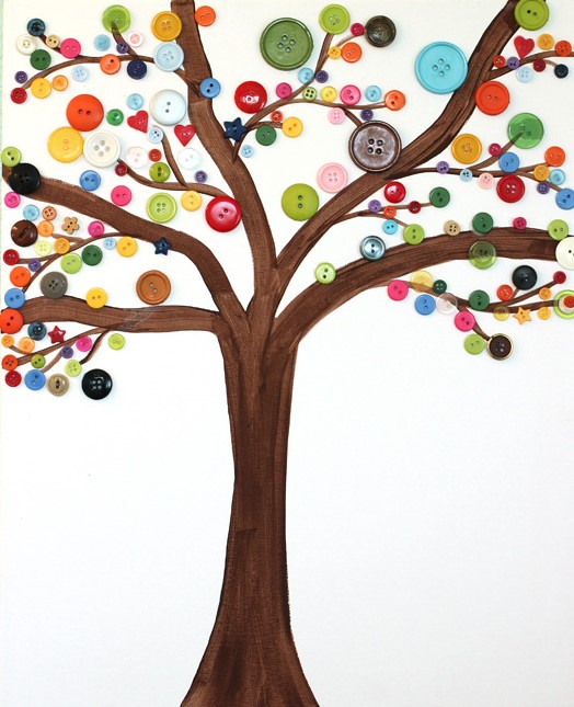 Image of tree trunk with long branches decorated with brightly colored buttons