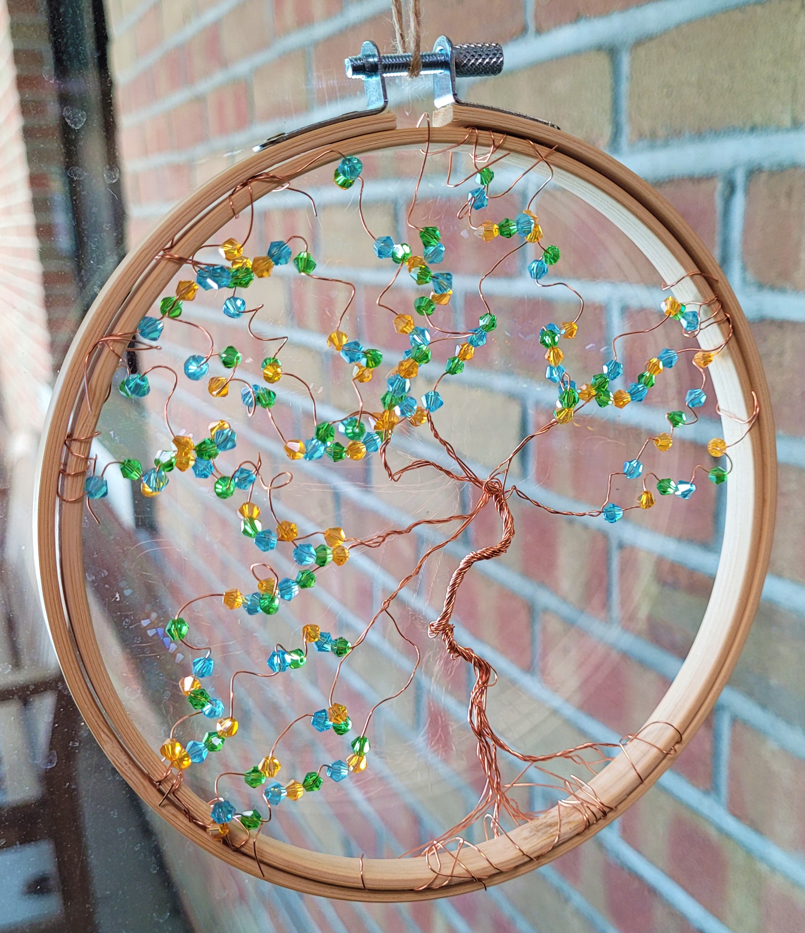 Sun Catcher made of embroidery hoop, wire, and colorful beads