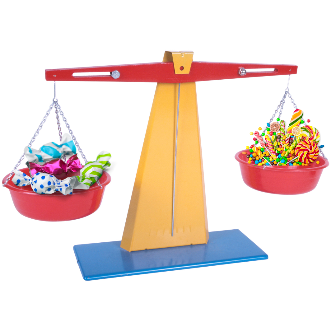 Balance Scales with two red buckets holding candy