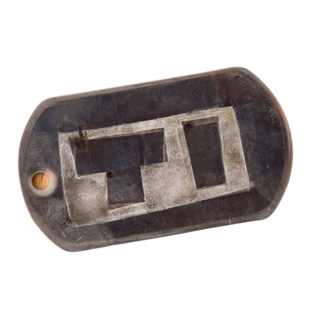 Metal Tag with electrical etching of letters T I