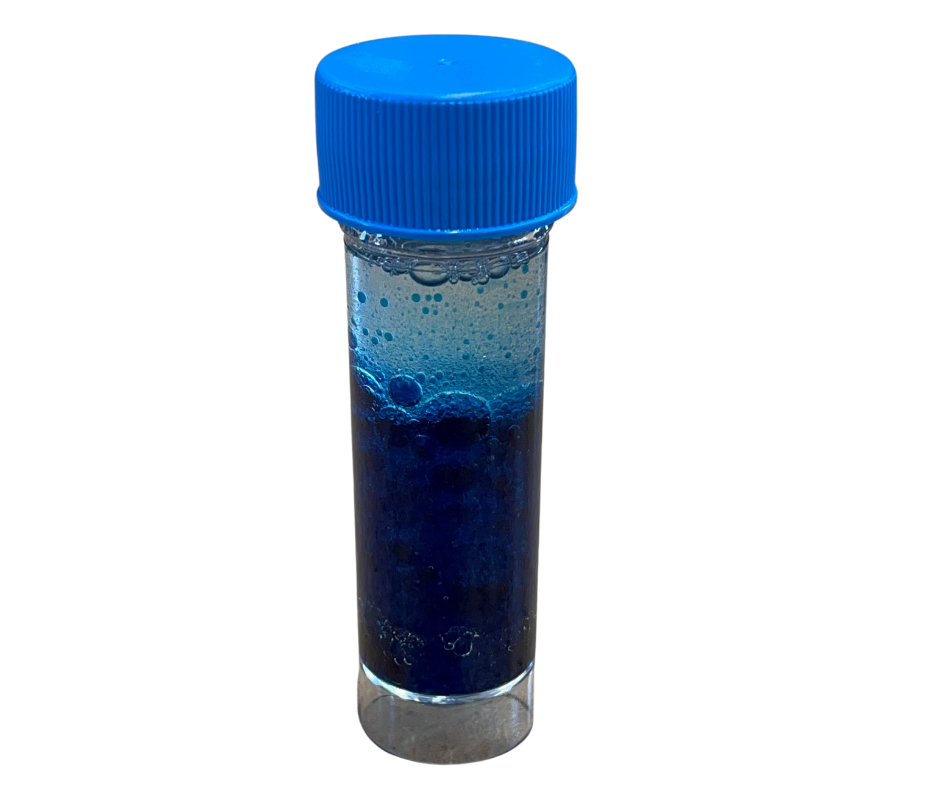 Test Tube Bottle with blue cap containing blue water and clear oil