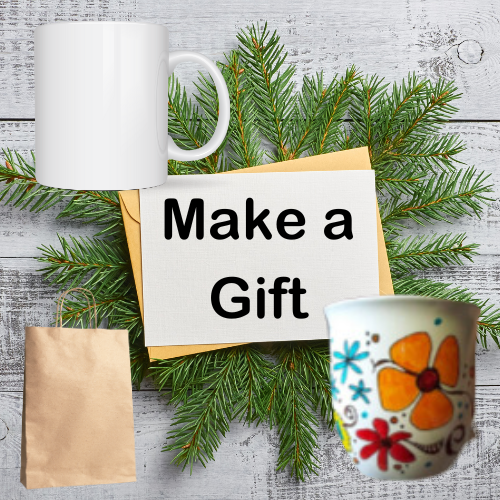 Examples of a white mug, a white mug with flower design using sharpies, a blank card with title of "Make a Gift" and brown gift bag