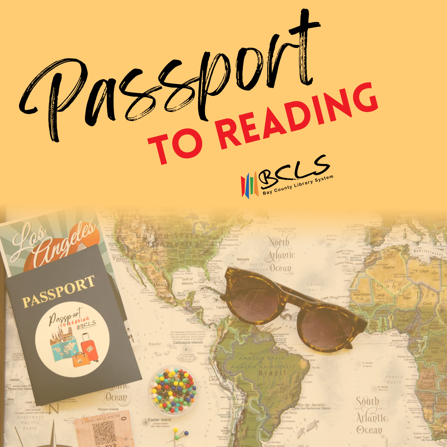 passport to reading against beige background with map, passport and black sunglasses