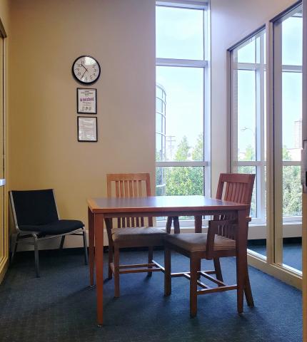 Wirt study room 3 with a table and three chairs