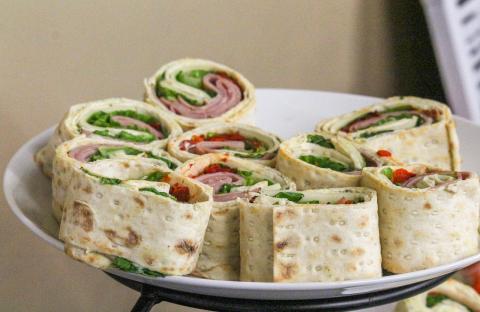A plate of food wraps