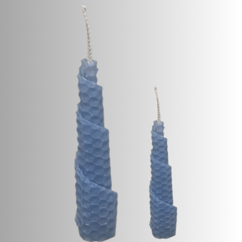 Gray gradient background with blue bee's wax candle example