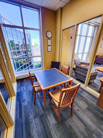 Wirt study room 3 with a table and three chairs