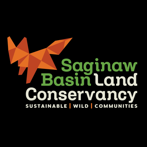 green and white text set against black background that reads saginaw basin land conservancy