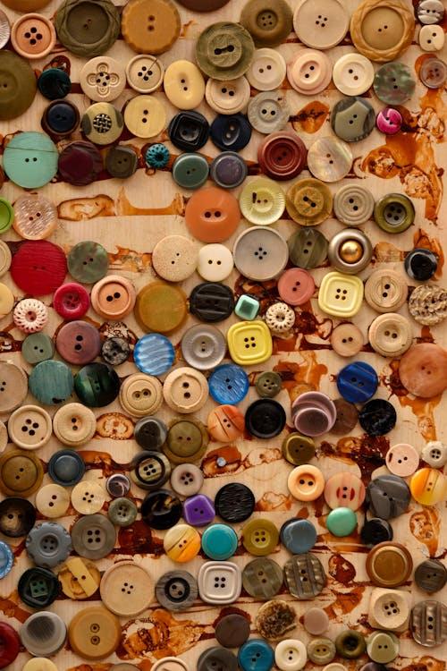 Image of an assortment of buttons in different shapes and sizes.